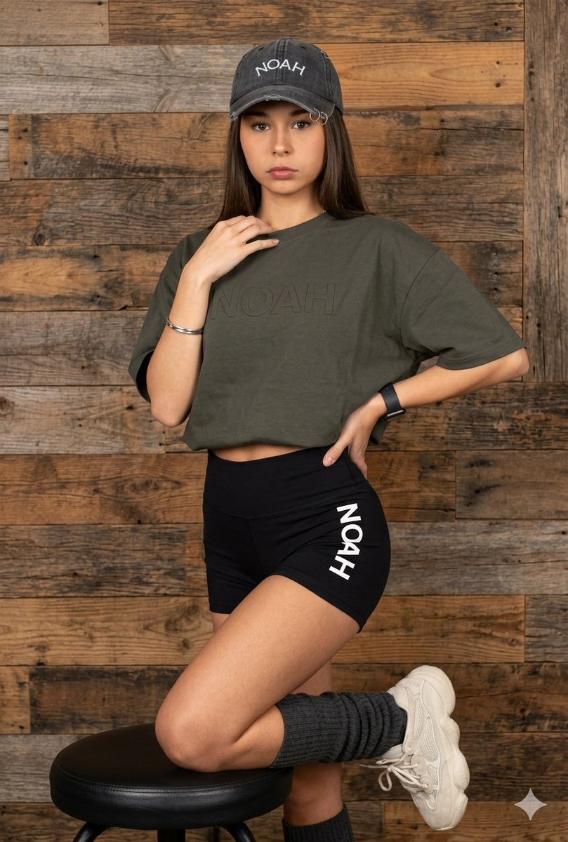 Latina Model in Distressed Denim and Wood Background