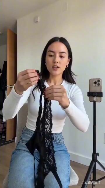 UGC video of a girl demonstrating stockings in a dressing room